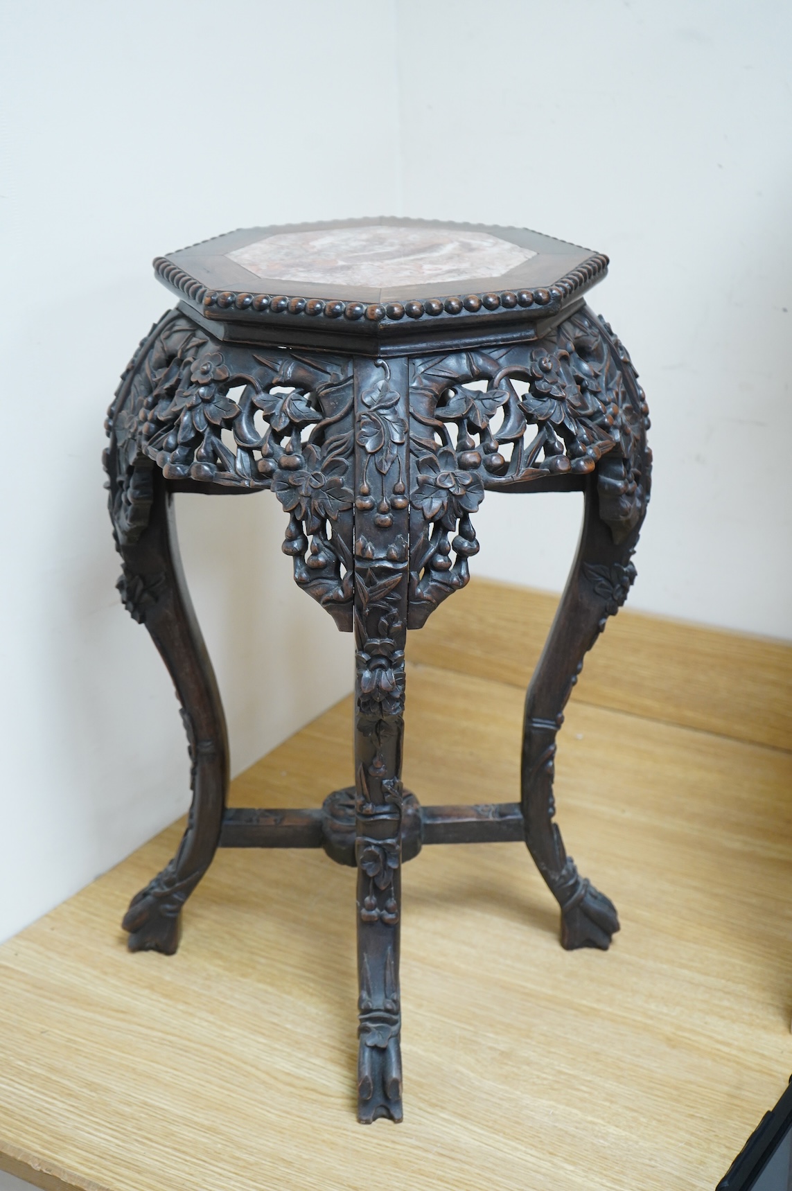 A late 19th/early 20th century Chinese marble inset hongmu jardinière stand, 60cm